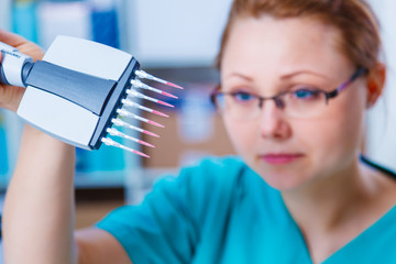 Nurse doing medical analysis