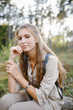 © Ilya Utkin - Young girl walking in the forest