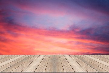 Wall Mural - Empty table top on blurred beautiful sky at sunset