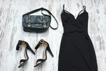 Wall Mural - Black dress, bag and black shoes. Fashionable concept