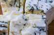 Danish blue cheese close up macro with moldy blue veins.
