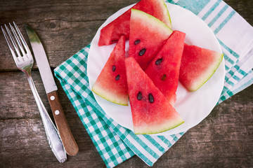 Wall Mural - Watermelon cuts with plate on cloth