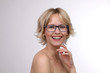 © Joerch - Hübsche blonde Frau mit Brille lacht