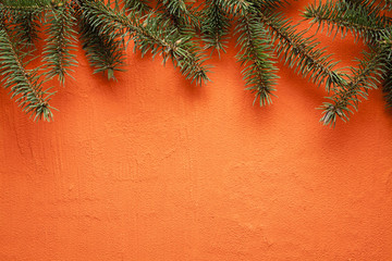 Sticker - Christmas background - spruce tree on orange plastered wall