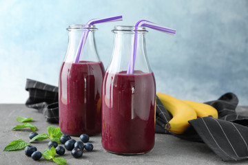 Sticker - Glass bottles with acai juice on table