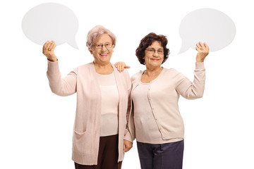 Wall Mural - Cheerful elderly women with speech bubbles