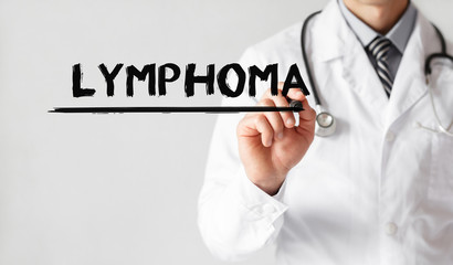 Wall Mural - Doctor writing word Lymphoma with marker, Medical concept