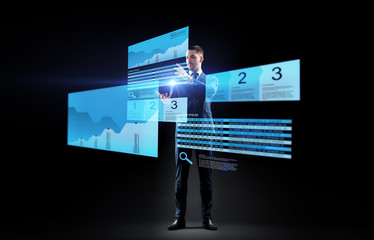 Wall Mural - businessman with stock charts on virtual screens