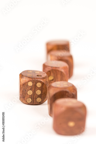 Selective focus on wooden gambling dice with individuality concept Poster