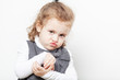 © Анна Демидова - The little curly girl frowned.