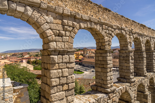 Fotografie, Obraz The ancient roman aqueduct in Segovia Spain.