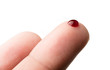 © Love the wind - Drop of blood on finger on white background