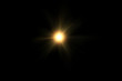 digital lens flare,sun burst on black background.