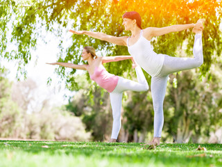 Young women exercising in the park