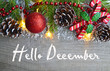Hello December.Christmas decoration on old wooden background.Winter holidays concept.Selective focus.