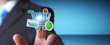© sdecoret - Businessman using digital shopping icons 3D rendering