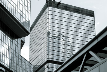 windows of commercial building in Hong Kong with B&W color
