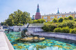 View of the Alexander Garden near Moscow Kremlin and fountain on Manezh Square at summer sunny day