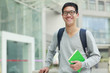 © BoBoPhoto - picture of one young asian male college student in campus