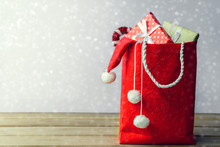 Christmas And Gift Boxes In Red Bag