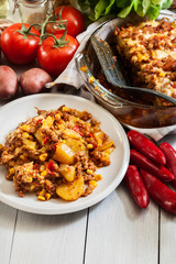 Wall Mural - Portion of mexican potato casserole with minced meat