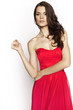 © EVGENY FREEONE - Brunette model in red dress posing