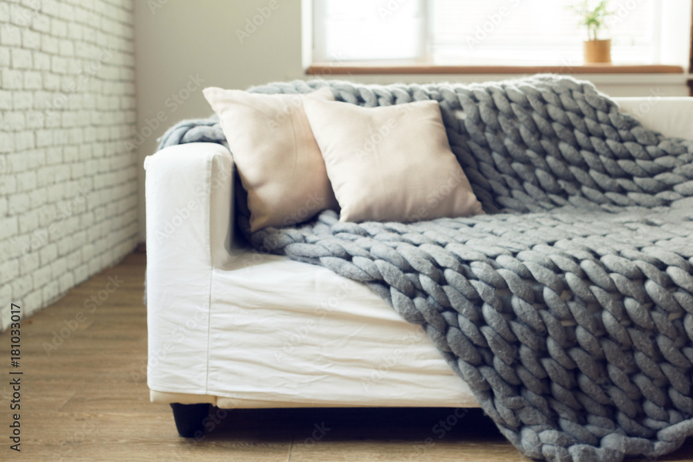 Grey knit giant plaid with pillows - obrazy, fototapety, plakaty 