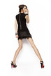 © EVGENY FREEONE - Fashionable brunette in a short dress