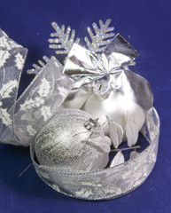 beautiful silvery New Year's ball, brilliant tinsel on a blue background - New Year's composition, a card