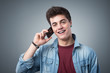 © StockPhotoPro - Smiling teenager having a phone call