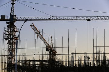 Wall Mural - The crane is working at the construction site