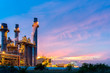 Oil refinery, petroleum and energy plant at twilight with sky background.  Industry Concept.