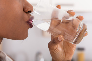 Woman Drinking Glass Of Water