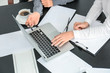 © Africa Studio - Office employees working with documents at desk