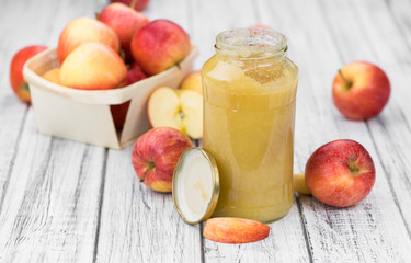 Canvas Print - Old wooden table with fresh made Applesauce