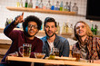 © LIGHTFIELD STUDIOS - friends with pizza and beer in bar