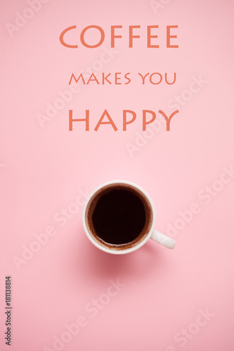Fotografía cup of coffee on pastel background with quotes