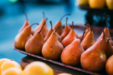 Wall Mural - Tbilisi, Georgia. Close View Of Fresh Pears In Tray On Showcase 