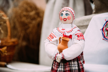 Wall Mural - Belarusian Folk Doll. National Traditional Folk Dolls Are Popular