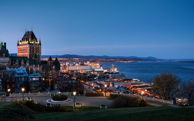 Quebec city panoramic view from high ground at twilight with city lights in background, Canada