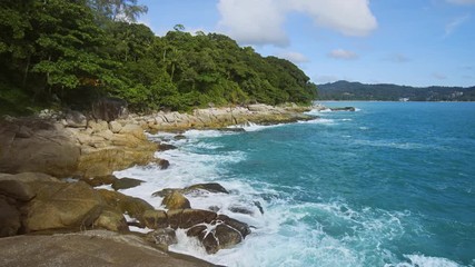 Wall Mural - Rocky Tropical Beach in Phuket, Thailand, with Waves and Sound