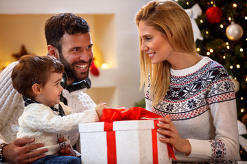 Wall Mural - Young family together for holiday