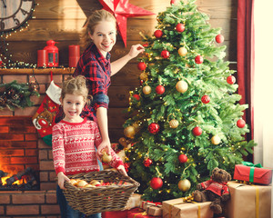 Sticker - happy family mother and child girl decorated Christmas tree