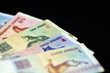 © Talulla - Obsolete Belarusian banknotes on a dark background close up