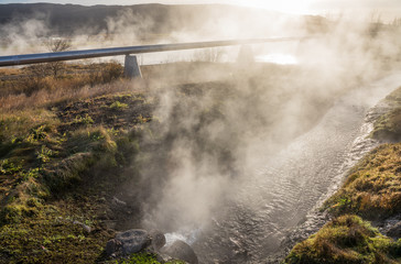 Geothermal Pipe in Landscape with Steam