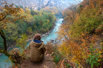 Freedom concept. Traveler over autumn landscape