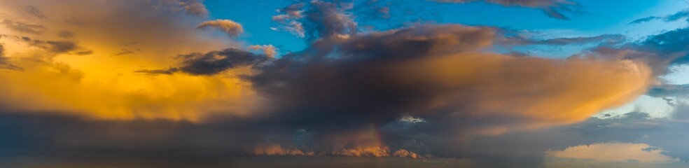 Wall Mural - dramatic, colorful evening sky after storm pass, sky only, high resolution panorama