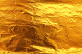 Fototapeta Desenie - Shiny yellow leaf dark gold foil texture background