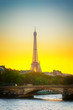 Eiffel tower over Alexandre III Bridgeat at sunset, Paris, France, retro toned