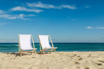 Deck chairs on beach